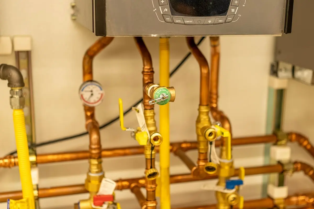 Licensed technician providing Backflow Prevention for a homeowner in Guthrie